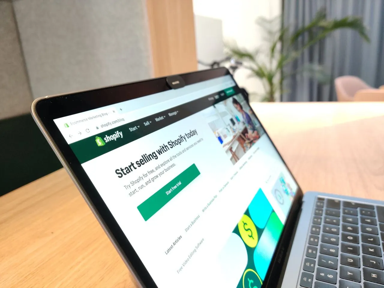 Shopify homepage open on the laptop